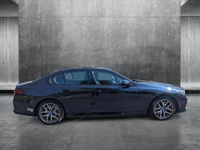 used 2024 BMW i5 car, priced at $53,955