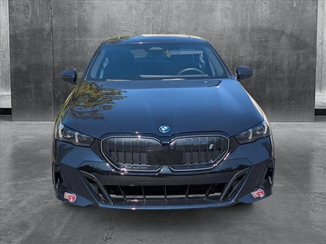 used 2024 BMW i5 car, priced at $53,955