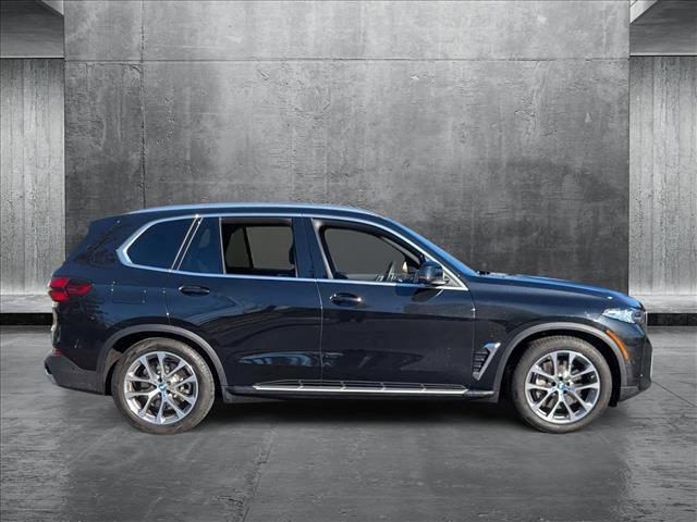 used 2025 BMW X5 PHEV car, priced at $66,487