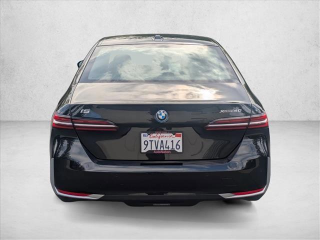 used 2025 BMW i5 car, priced at $65,888