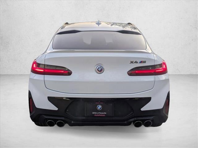 used 2022 BMW X4 M car, priced at $53,987