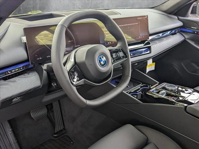 used 2024 BMW i5 car, priced at $59,188