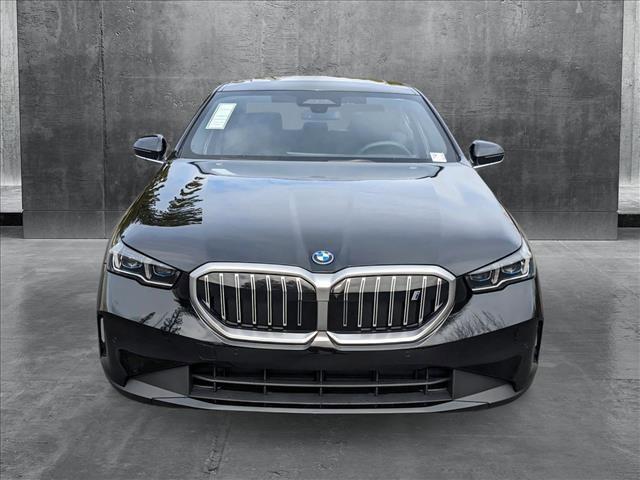 used 2024 BMW i5 car, priced at $59,188