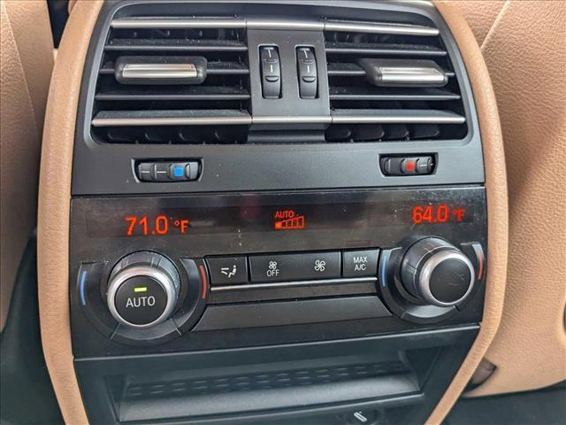 used 2015 BMW 740 car, priced at $17,487