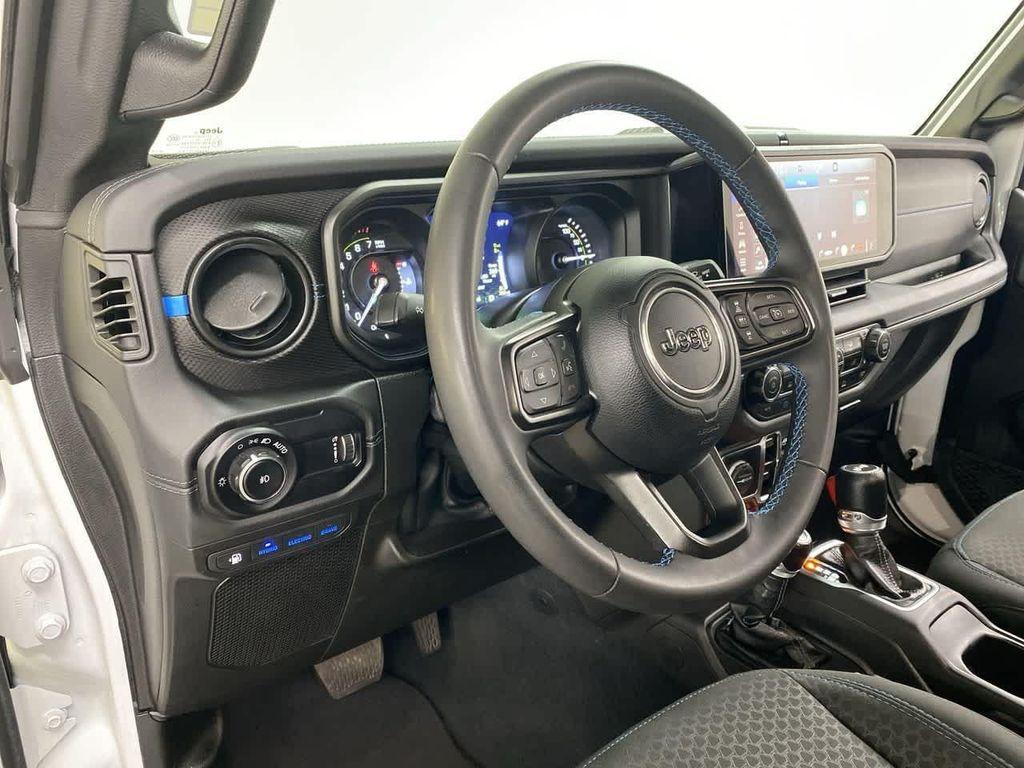 used 2024 Jeep Wrangler 4xe car, priced at $33,990