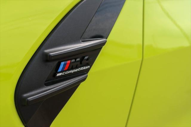 used 2022 BMW M4 car, priced at $65,000