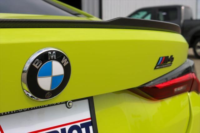 used 2022 BMW M4 car, priced at $65,000