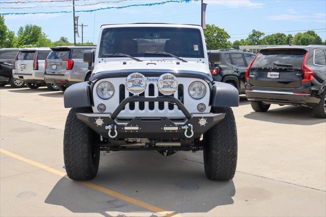 used 2015 Jeep Wrangler Unlimited car, priced at $28,400