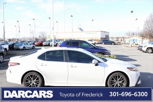 used 2024 Toyota Camry Hybrid car, priced at $28,491