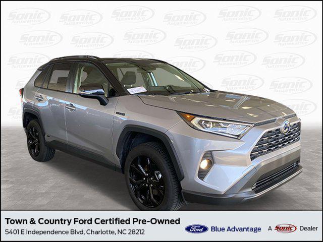 used 2021 Toyota RAV4 Hybrid car, priced at $29,999