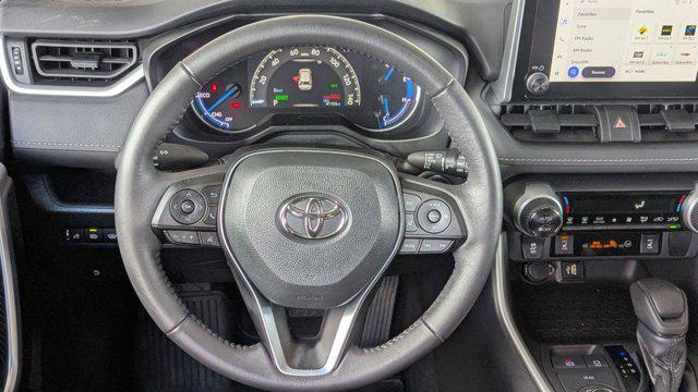 used 2023 Toyota RAV4 Hybrid car, priced at $29,999