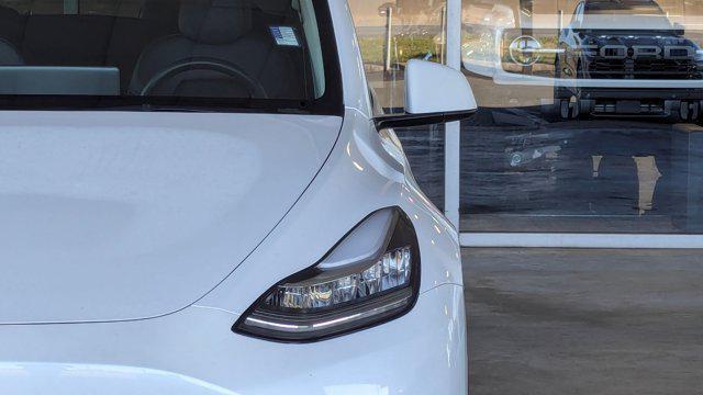 used 2023 Tesla Model Y car, priced at $29,999