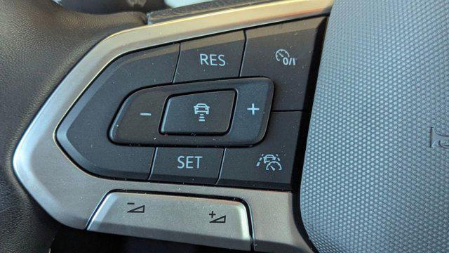 used 2025 Volkswagen Taos car, priced at $21,999