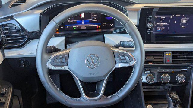 used 2025 Volkswagen Taos car, priced at $21,999