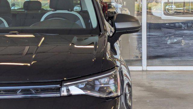 used 2025 Volkswagen Taos car, priced at $21,999