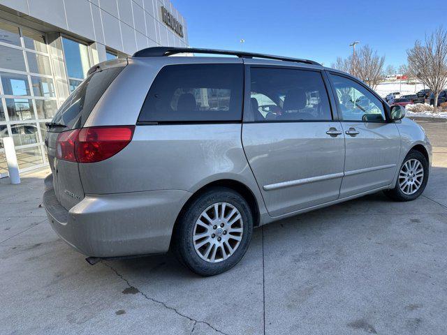 used 2009 Toyota Sienna car, priced at $9,999