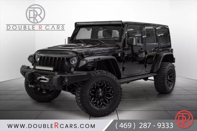 used 2013 Jeep Wrangler Unlimited car, priced at $18,559