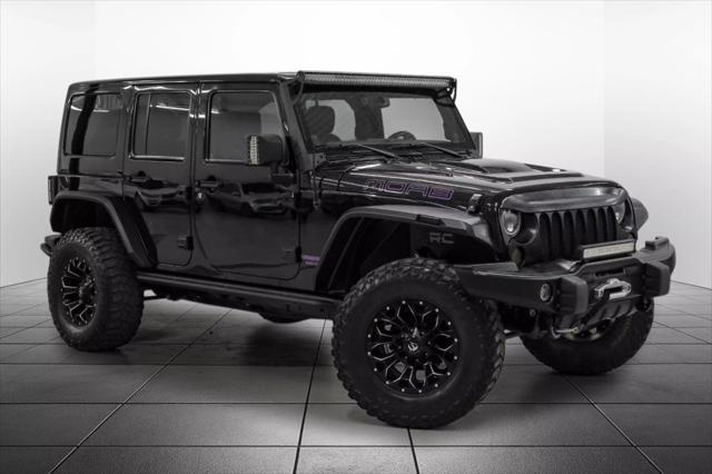 used 2013 Jeep Wrangler Unlimited car, priced at $18,559