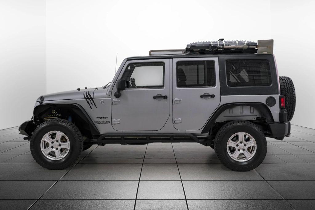 used 2014 Jeep Wrangler Unlimited car, priced at $15,888