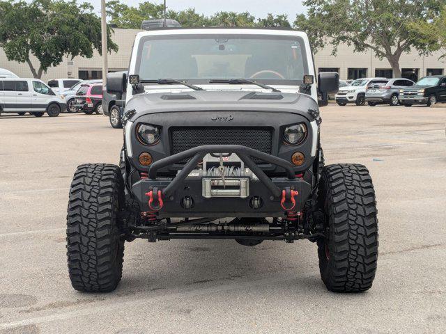 used 2016 Jeep Wrangler Unlimited car, priced at $20,433