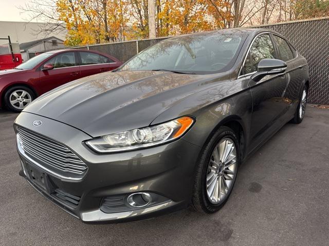 used 2016 Ford Fusion car, priced at $10,571