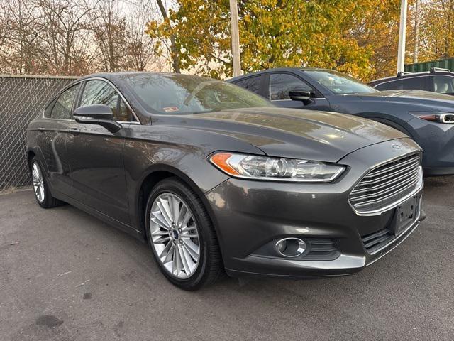 used 2016 Ford Fusion car, priced at $10,571