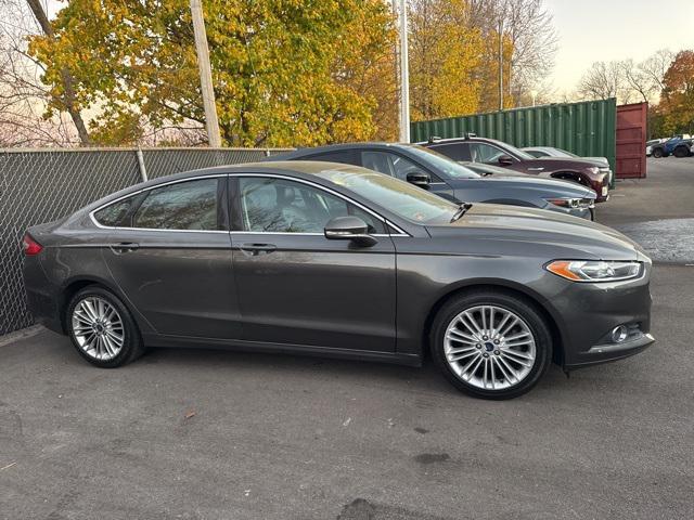 used 2016 Ford Fusion car, priced at $10,571