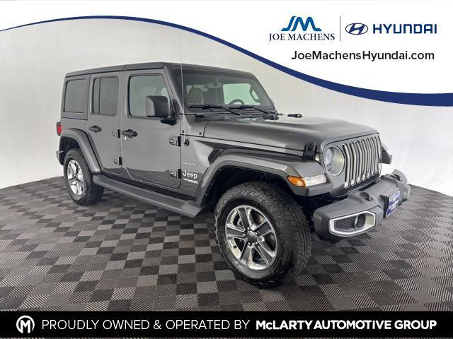 used 2021 Jeep Wrangler Unlimited car, priced at $25,900