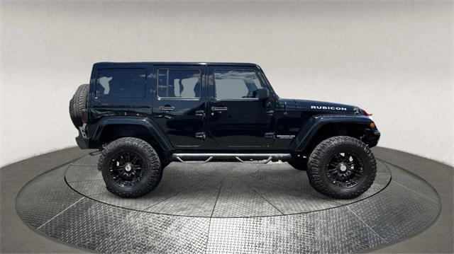 used 2014 Jeep Wrangler Unlimited car, priced at $18,995