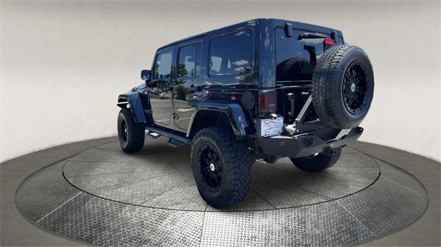 used 2014 Jeep Wrangler Unlimited car, priced at $18,995