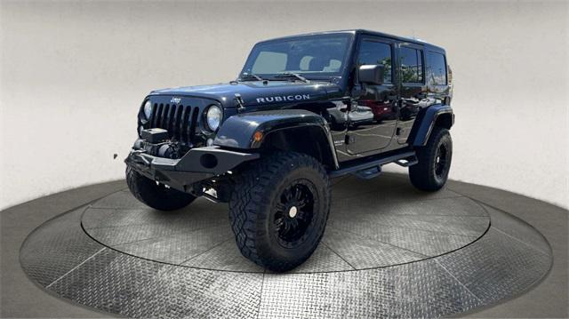 used 2014 Jeep Wrangler Unlimited car, priced at $18,995