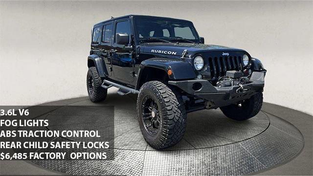 used 2014 Jeep Wrangler Unlimited car, priced at $18,995