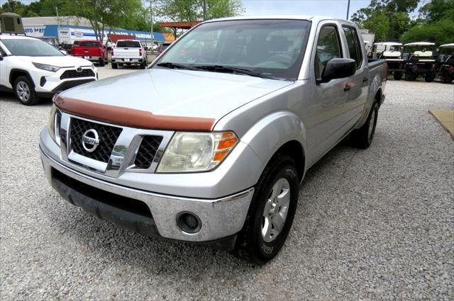 used 2009 Nissan Frontier car, priced at $13,800