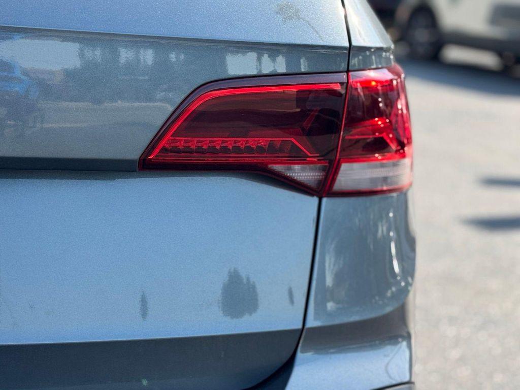 used 2022 Volkswagen Taos car, priced at $18,995
