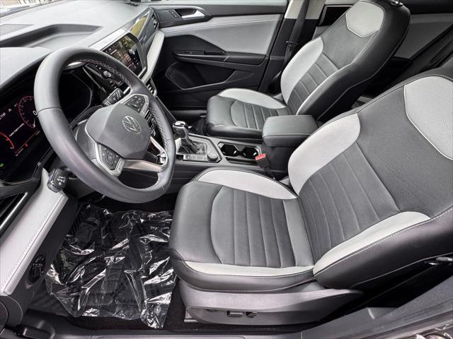 used 2023 Volkswagen Taos car, priced at $24,995