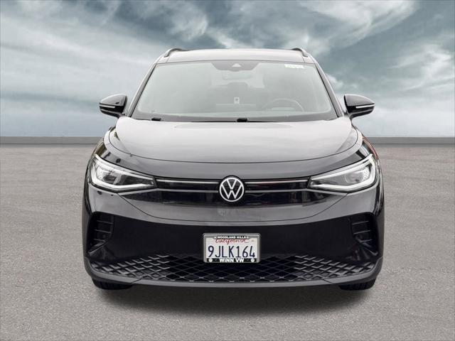 used 2023 Volkswagen ID.4 car, priced at $25,995