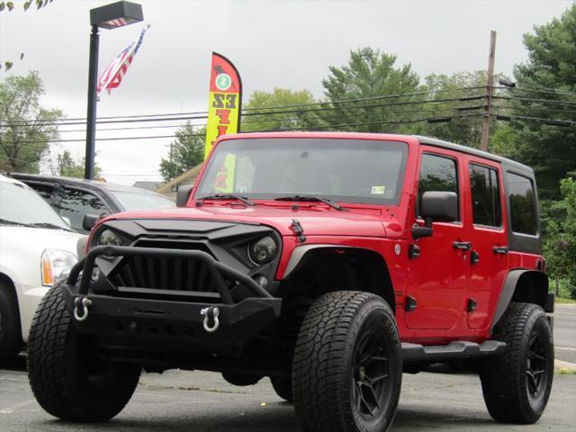 used 2014 Jeep Wrangler Unlimited car, priced at $17,795