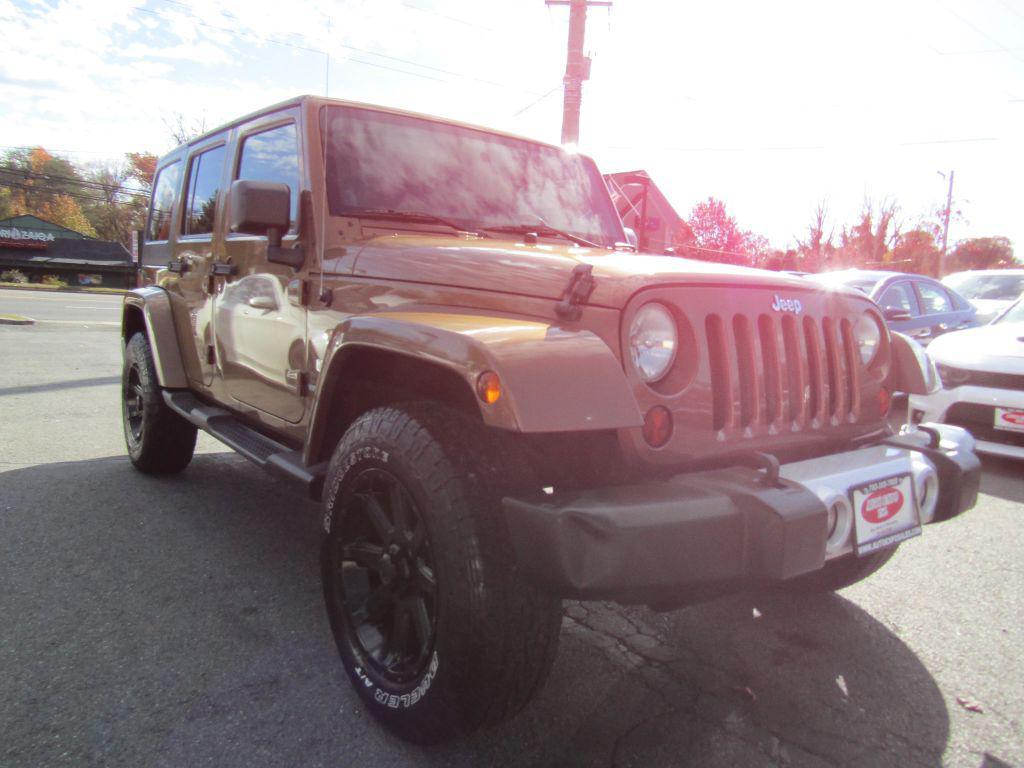 used 2011 Jeep Wrangler Unlimited car, priced at $13,995