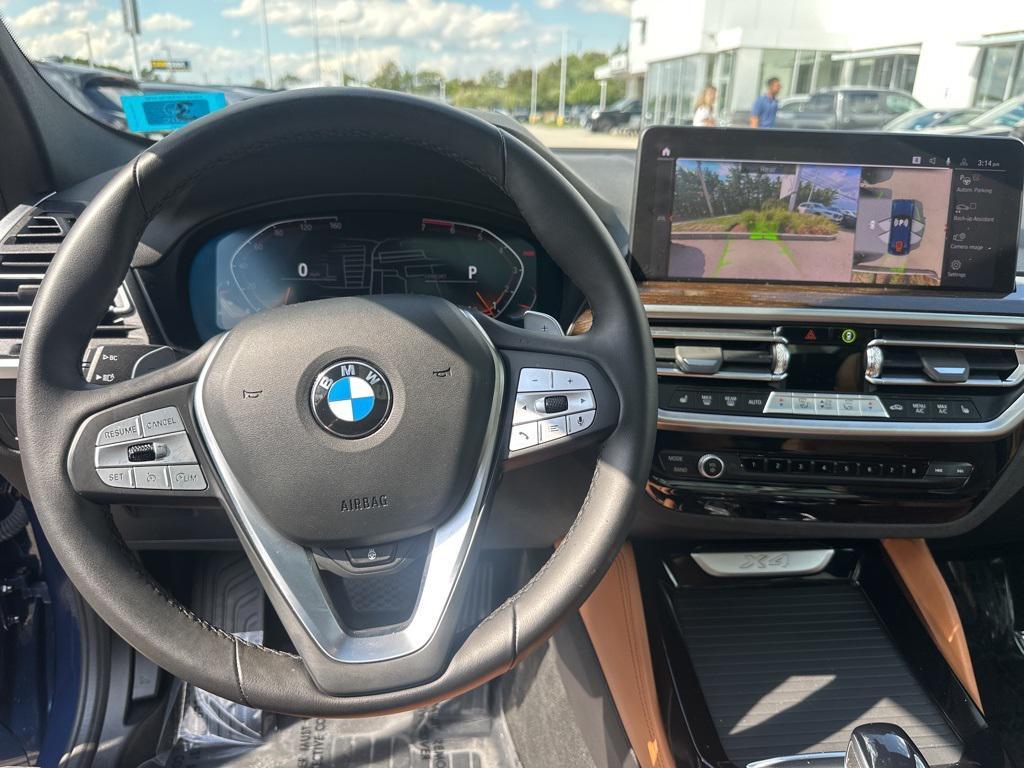 used 2025 BMW X4 car, priced at $49,640