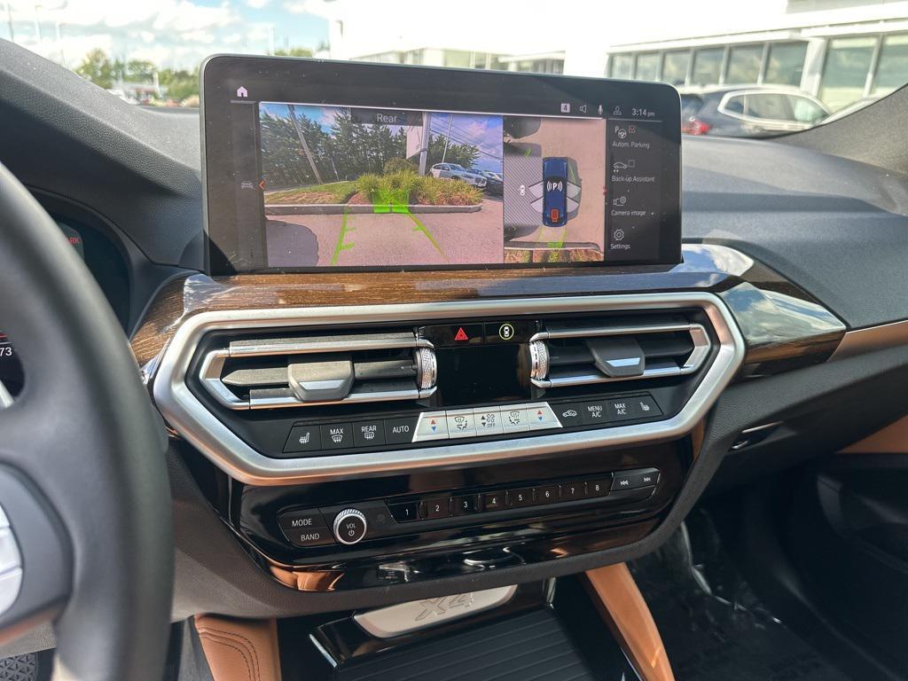 used 2025 BMW X4 car, priced at $49,640