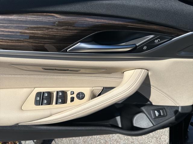 used 2022 BMW 530 car, priced at $37,686