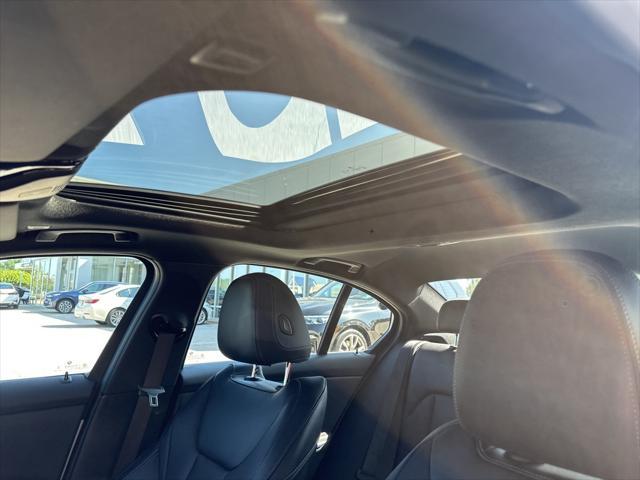 used 2024 BMW 330 car, priced at $38,482