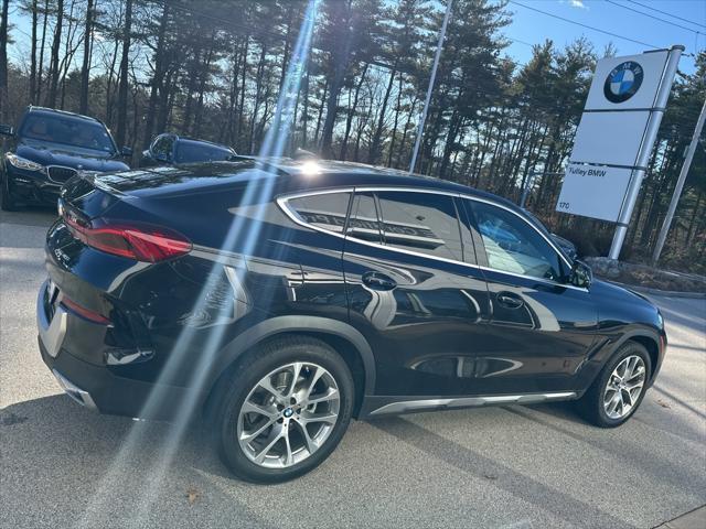 used 2023 BMW X6 car, priced at $60,997