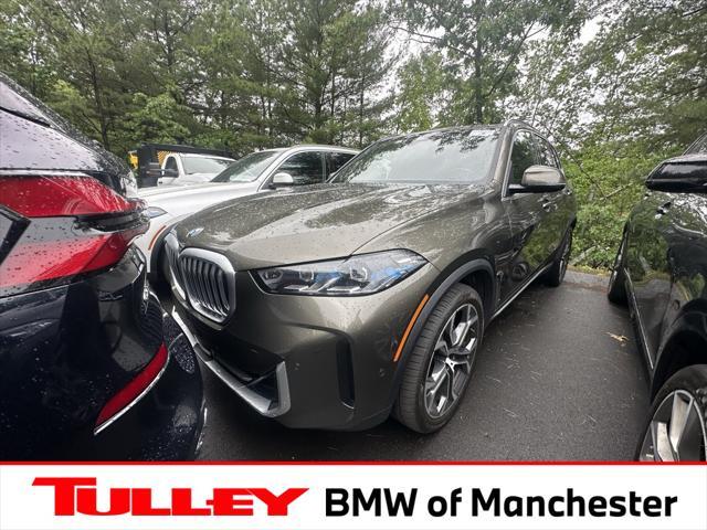used 2025 BMW X5 car, priced at $68,911