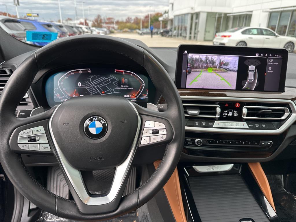 used 2024 BMW X4 car, priced at $47,300