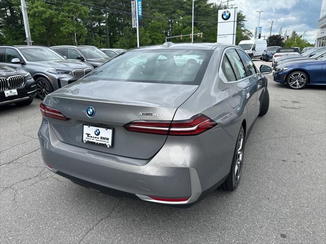 used 2025 BMW i5 car, priced at $59,989