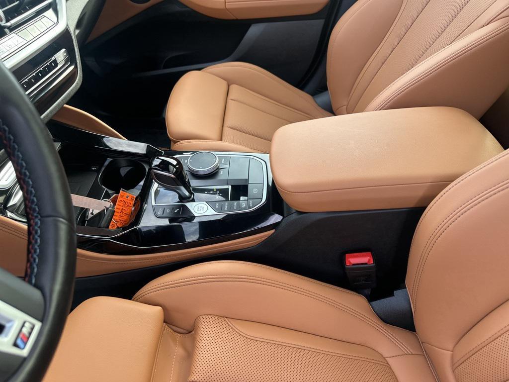 used 2025 BMW X4 car, priced at $59,990