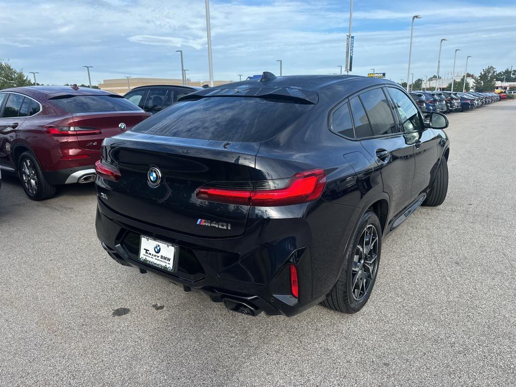 used 2025 BMW X4 car, priced at $59,990