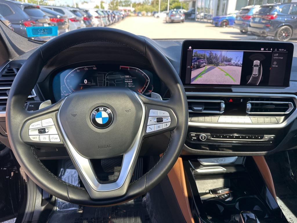 used 2024 BMW X4 car, priced at $43,905