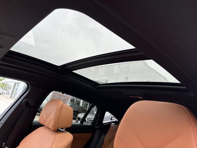 used 2025 BMW X6 car, priced at $82,906